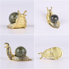 SHENGTIAN 2-Piece Set, 2-Inch Handcrafted Gold Snail Statues with 0.78-Inch Natural Dragon Blood Crystal Balls, Symbolizing Safety and Journey, Ideal for Desk and Home Decor (Dragon Blood)
