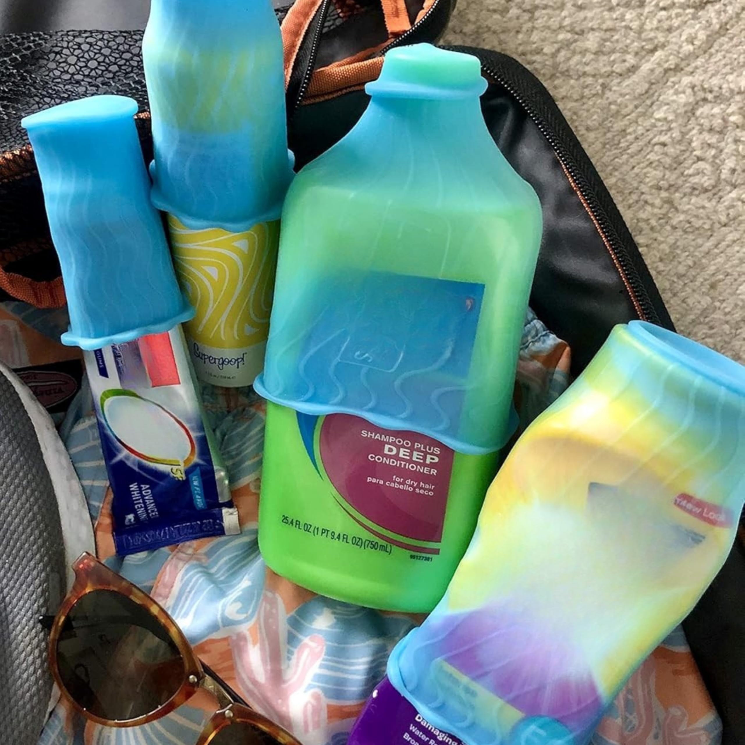 LeakLocks® Toiletry Skins™ Elastic Sleeve for Leak Proofing Travel Container in Luggage. For Standard and Travel Sized Toiletries. Reusable Accessory for Travel Bag Suitcase and Carry-on Luggage